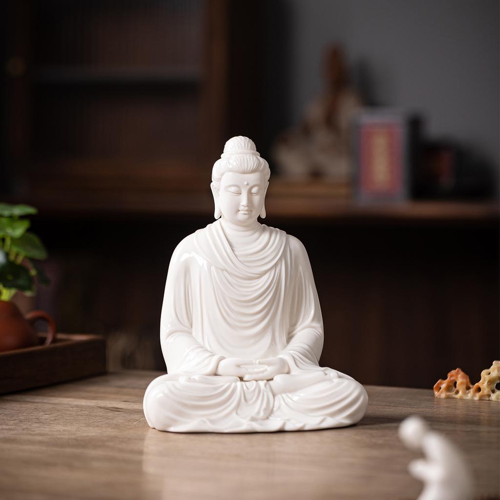 The Buddha statue of Sakyamuni and the Great Sun Buddha for home living room worship, office decoration, craft gifts and ornamen