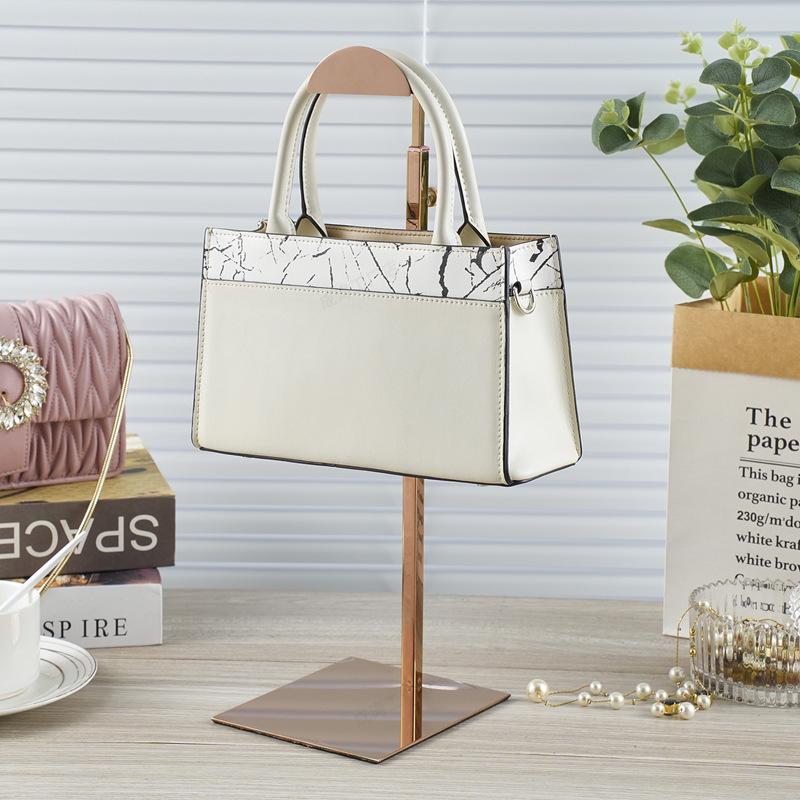 Verstellbarer Edelstahl Taschen-Präsentationsständer für Damentaschen