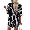 Black & White Geometric Two-Piece Set: Loose Short-Sleeve Shirt & Drawstring Shorts
