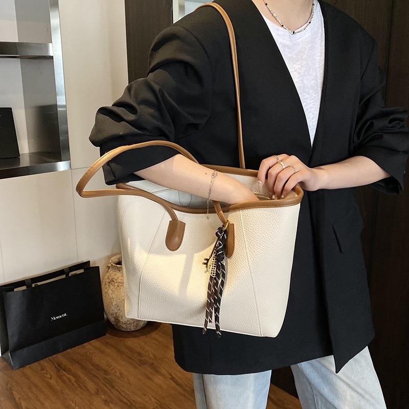 Premium Textur Retro Pendler Damen Tasche neu atmosphärisch schlicht und vielseitig Schulter Achseltasche Tragetasche