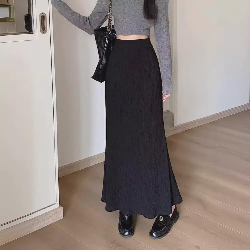 2024 Spring Women's Fishtail Skirt: French Retro Pleated A-Line with High Waist and Slimming Design.