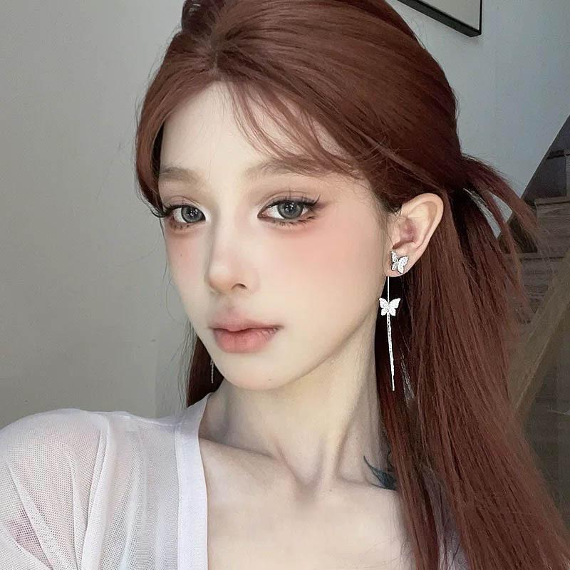 

Light luxury flash zirconium butterfly fringed earrings, fashion temperament, niche earrings, high-end mosquito coil disc ear clips, no ear piercings.