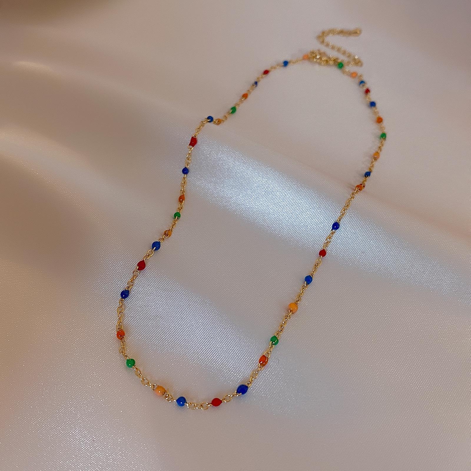 

Vintage Color Rice Grain Beaded Necklace Women S Pearl Clavicle Chain Titanium Steel Oil Drop Interval Design Sense Search Neck Chain Women