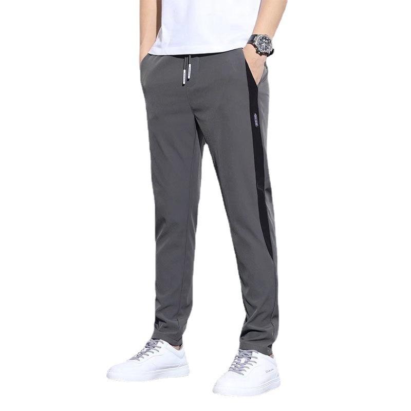 Casual trousers men's summer new four-sided elastic thin ice silk straight pants light business splicing slim pants