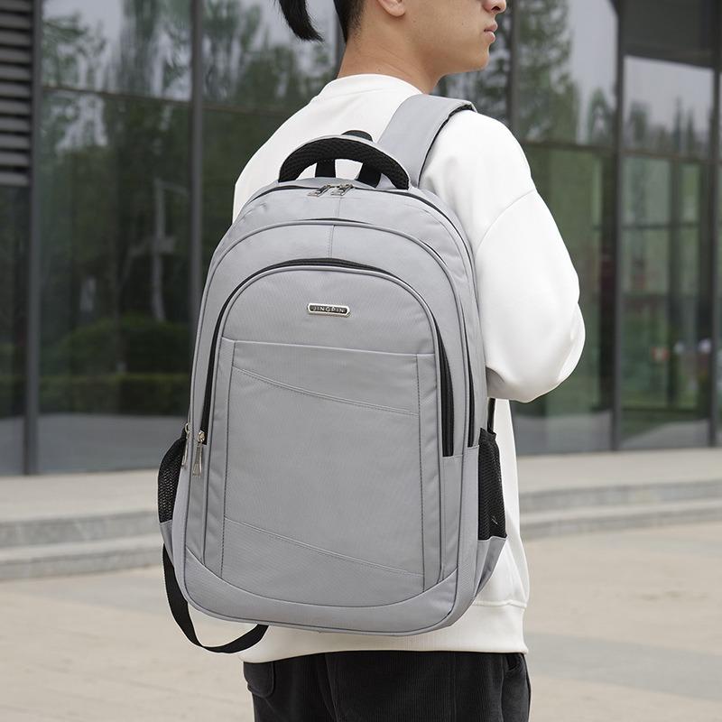 Business and leisure laptop bag, men's high-end simple backpack, large-capacity commuter backpack.