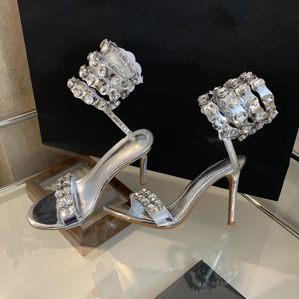 

мода Модные женские босоножки с кристаллами, стразами, цепочкой, перекрестным ремешком, на шпильках, тонкие высокие каблуки, черные, золотые, серебряные, туфли-лодочки для вечеринок, размер 35-39 7.5