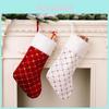 Festive Christmas Stockings With Plush Trim And Sparkling Accents In Red And White For Holiday Cheerful Decor