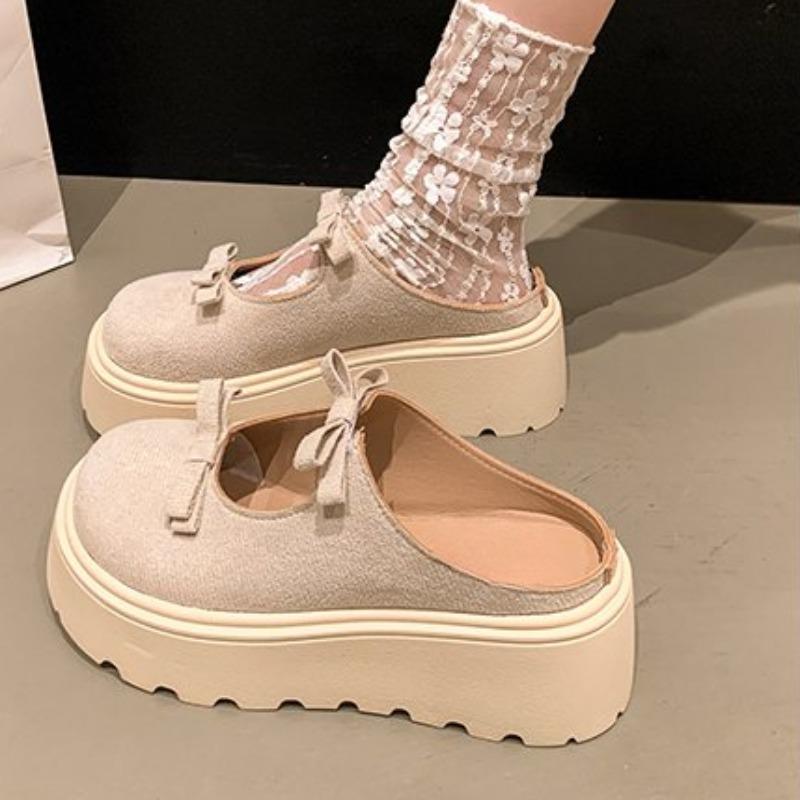 Mode Baotou Hausschuhe Sommer Neu Rundkopf Flachmund Flanell Schmetterlingsknoten Wasserdicht Tisch Rutschfeste Sandalen