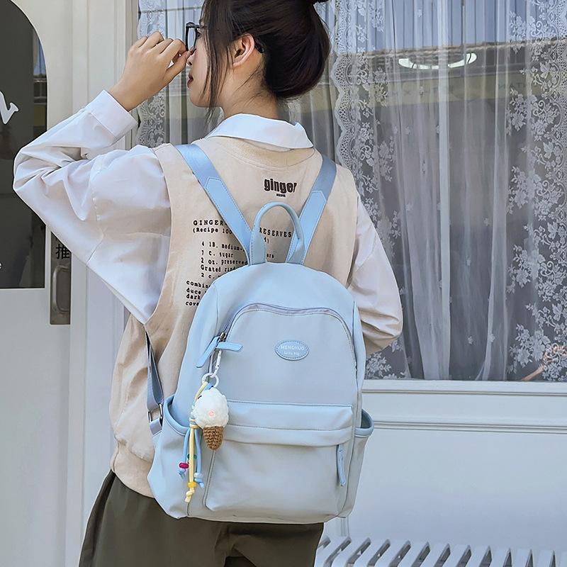 Backpack women 2025 new fashion and leisure junior high school students travel backpack simple versatile college bag tide