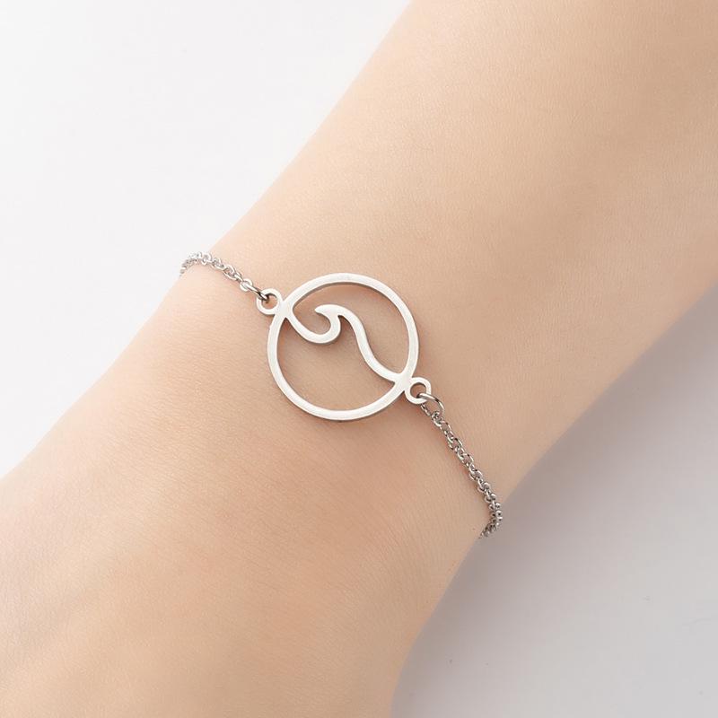 2025 Summer Stainless Steel Geometric Wave Bangle - Simple Hollow Round Pendant Bracelet