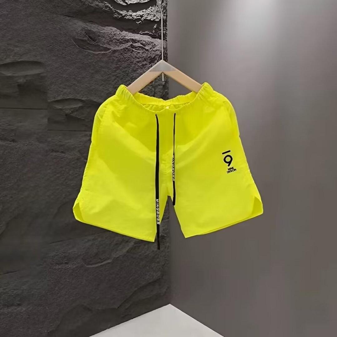 

Мужской летний тренд 2024 года: Пляжные шорты с красочной вышивкой - молодежный американский стиль, свободный крой, быстросохнущие 2XL