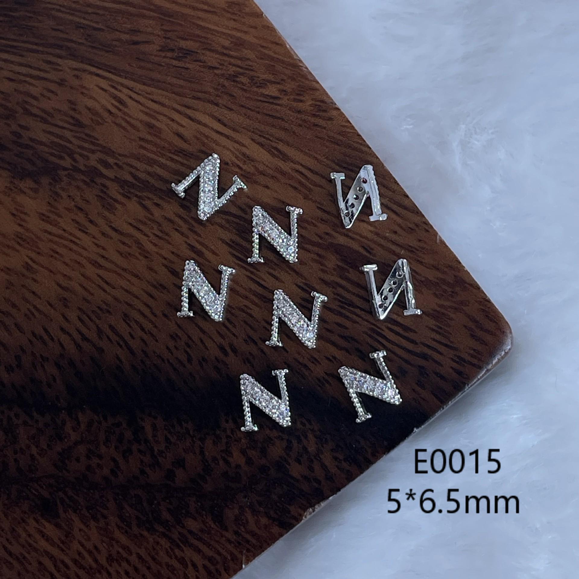 

Nail Art Rhinestones: 478 Metal Zircon Combo with Gold, Silver, and 26 English Letters for 3D Nail Decoration
