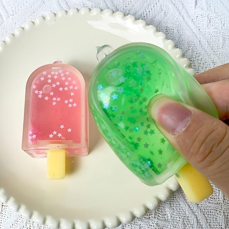 Taba Squishy Glitzer Eis am Stiel Fidget Squishy Mini Eiscreme Fake Food Squishy Angstlöser Stressabbau Entlüftungsspielzeug Entspannendes Geschenk