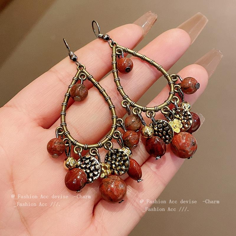 Water drop tassel earrings New Chinese retro temperament High-end ear hook Niche fashion design earrings Women