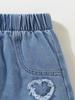 Single-piece girls' denim shorts, slim fit, Korean style, fashionable and versatile, heart-patterned frayed hem, blue elastic waistband.