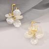 Iridescent White Flower Petal Drop Earrings Gold Tone Brushed Metal Dangle Studs Elegant Summer Floral Jewelry for Women