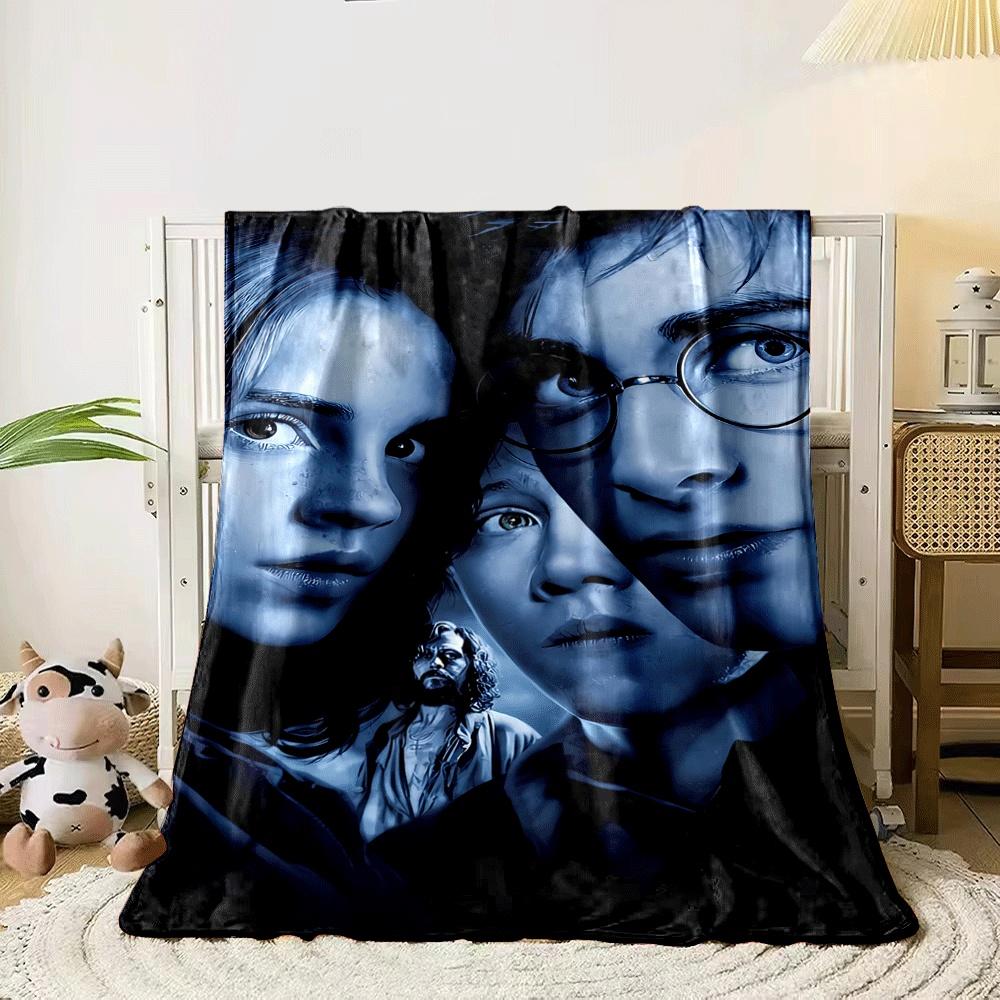 Dark, blue-toned portrait with sharp contrast and partial face visibility. for all seasons blanket lunch break throw gift