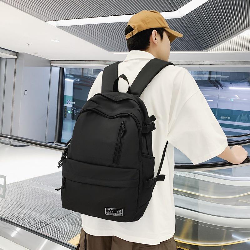 New Korean version of men's and women's large-capacity backpack, junior high school student schoolbag, casual couple college student backpack