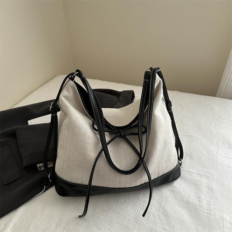 

Холщовая сумка большой вместимости женская осень 2025 новая на плечо, сумка-мессенджер, контрастная цветная вставка, сумка-тоут для поездок на работу, тренд белый