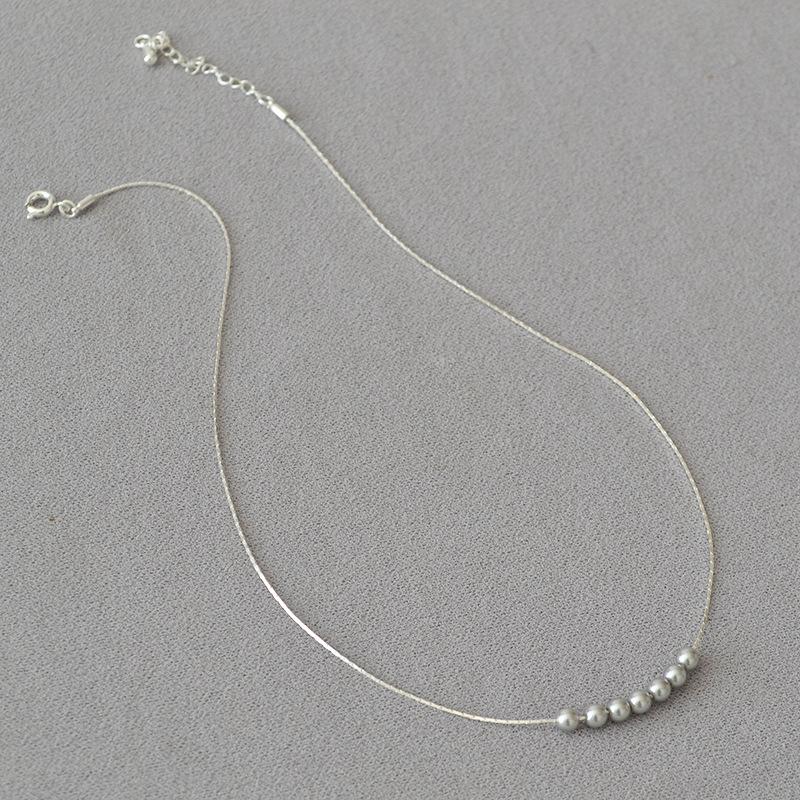 Japanese-Korean Mini High-Gloss Genuine Pearl Necklace: Gold-Plated Brass, Delicate Clavicle Chain for Women.