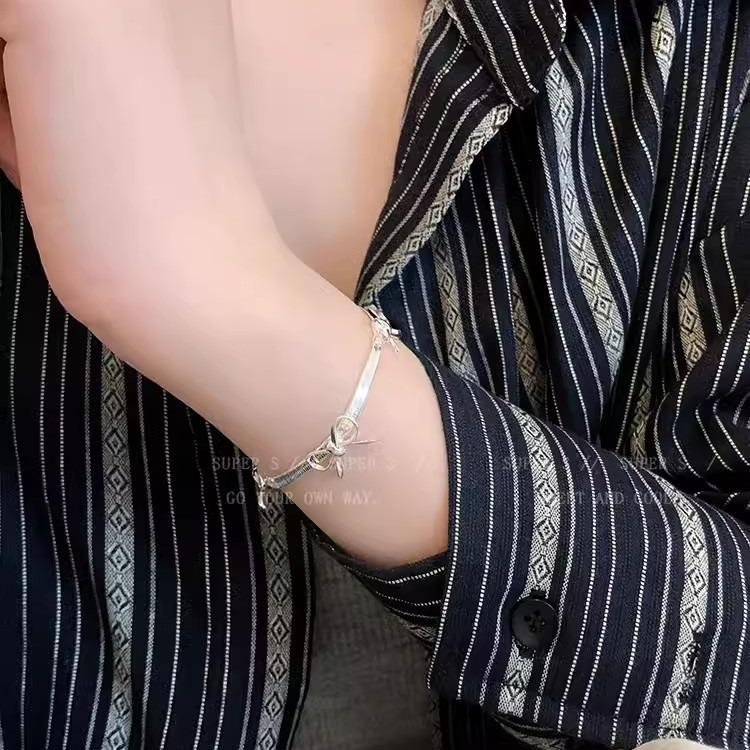 Minimalist style silver bow snake bone bracelet women's light luxury niche high-end temperament jewelry student girlfriend accessories