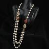 of Vintage Long and Unique Sweater Chain Design with a Court-style Glazed Pearl Necklace