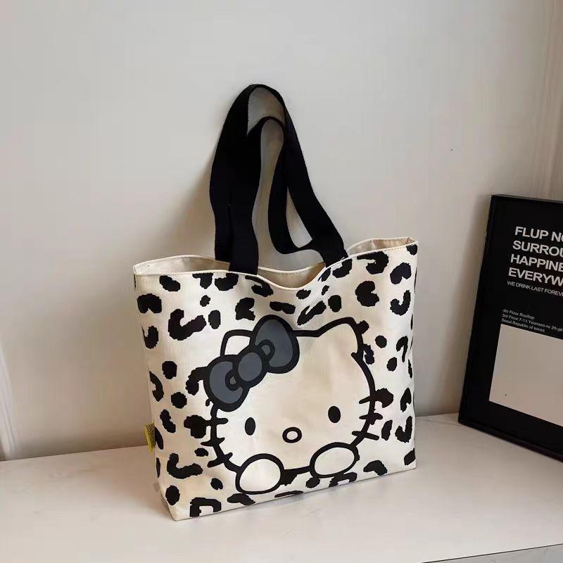 Cartoon canvas bag, women's versatile shoulder commuter tote bag, large-capacity student class handheld book gift bag