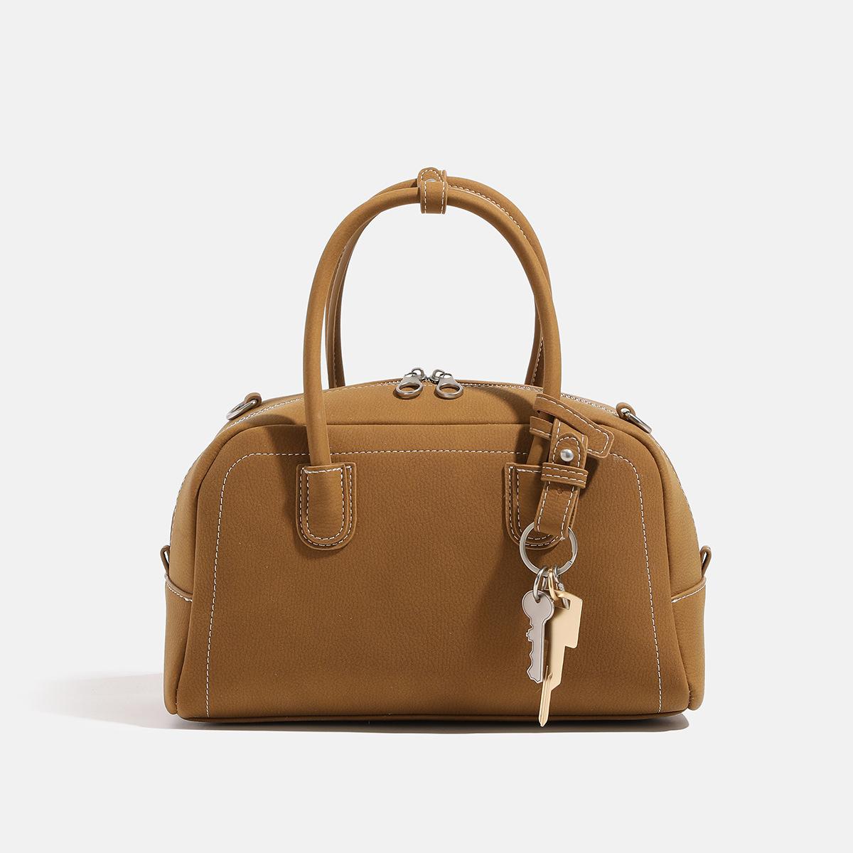 

Suede Retro Boston Bag with Silver Strap Lock Key for Autumn and Winter Commuting, Hand-held Bowling Bag, Single Shoulder Crossbody Bag