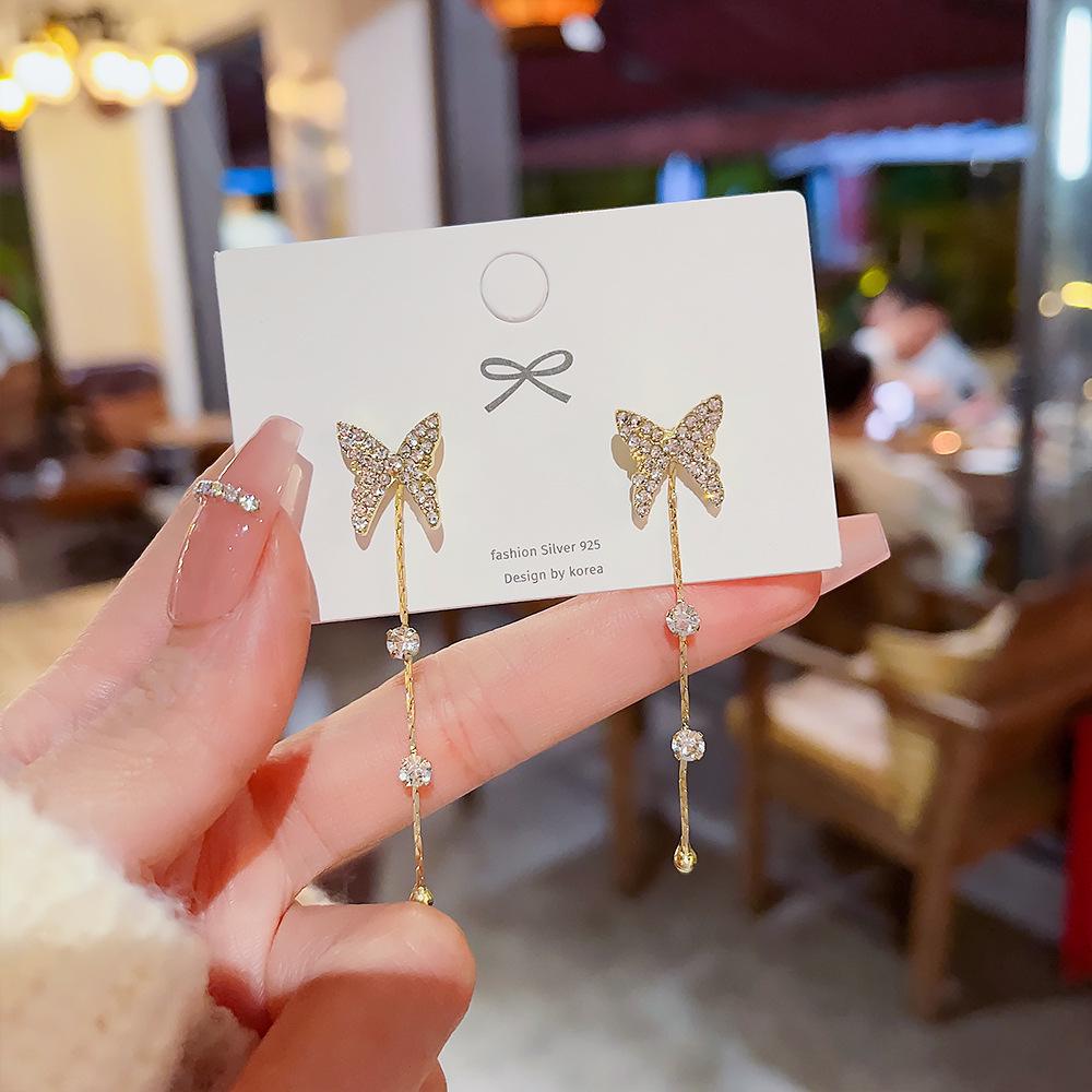 

2025 Exaggerated Butterfly Tassel Stud Earrings - High-End Women s Niche Design