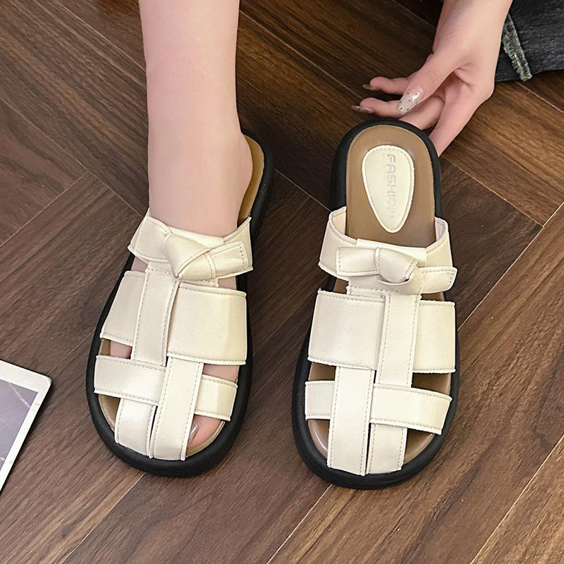 2025 summer new bag head half slippers female retro woven cool slippers female retro fairy wind soft flat Roman shoes