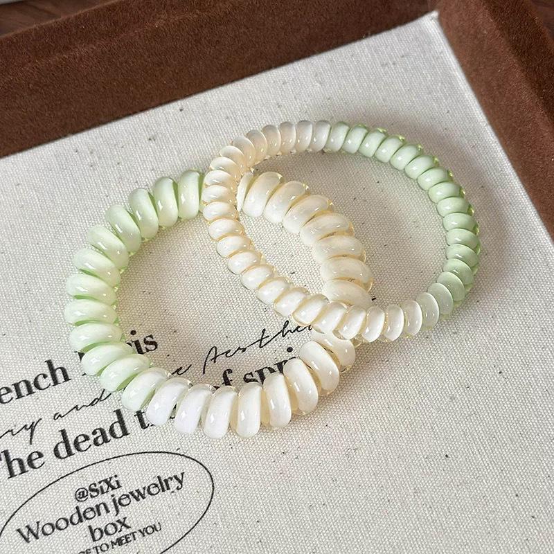 Elastic Hair Ties - No-Pull, Versatile & Stylish for 2024