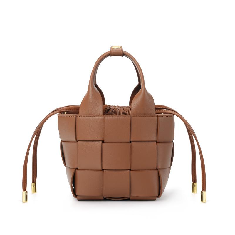 New high-end leather woven vegetable basket women's bag niche design women's soft cowhide portable messenger bucket bag