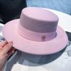 Cappello a tesa piatta in stile britannico con materiale in feltro di lana e tesa larga per la moda invernale