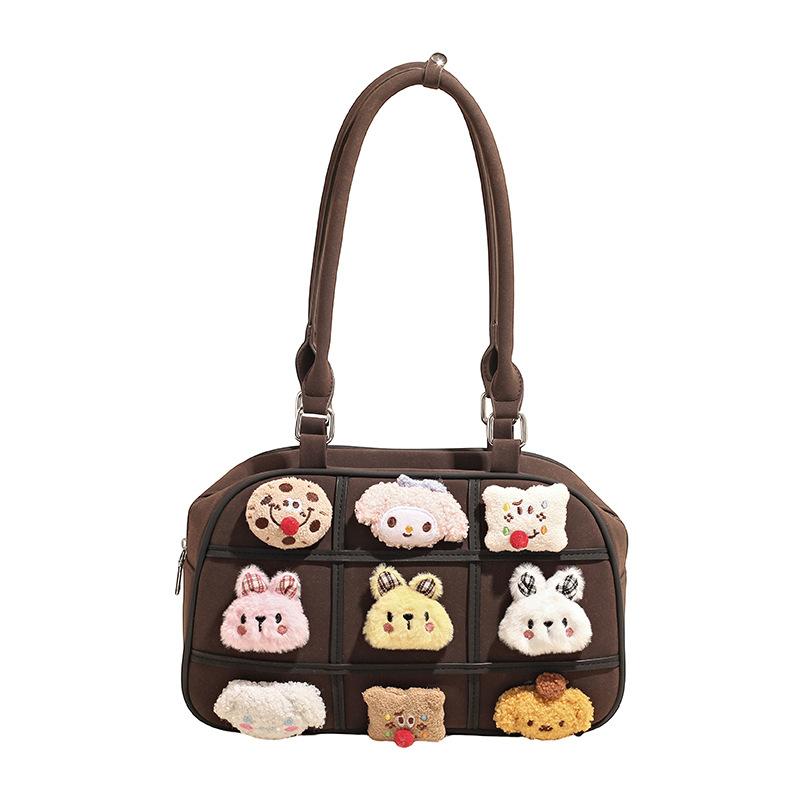 

Autumn and winter Jiugongge doll women s bag 2025 new simple casual cute pendant versatile texture foreign style commuting portable