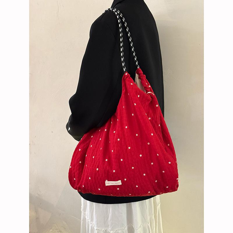Korean large-capacity polka dot canvas bag, new lazy style commuter shoulder tote bag, niche versatile underarm bag