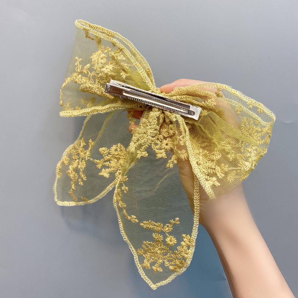 

Стиль відпустки Свіжий качкодзьоб Затискач Ручна робота Індустріальні заколки Застібка з бантом Мереживо з бантом Бант Замок Clip жовтий