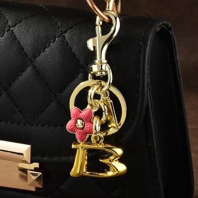 Charming Floral Letter Keychain: Cherry & Plum Blossom Pendant for Ladies Bags