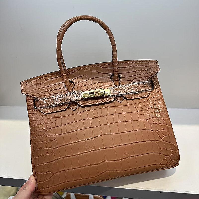 Pelle bovina primo strato motivo alligatore opaca portatile a spalla a tracolla borsa da donna premium transfrontaliera