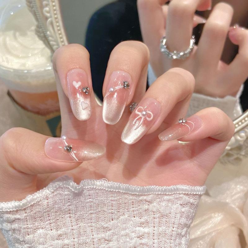 Gentle Blush Gradient Cat Eye Manicure with Butterfly Accents