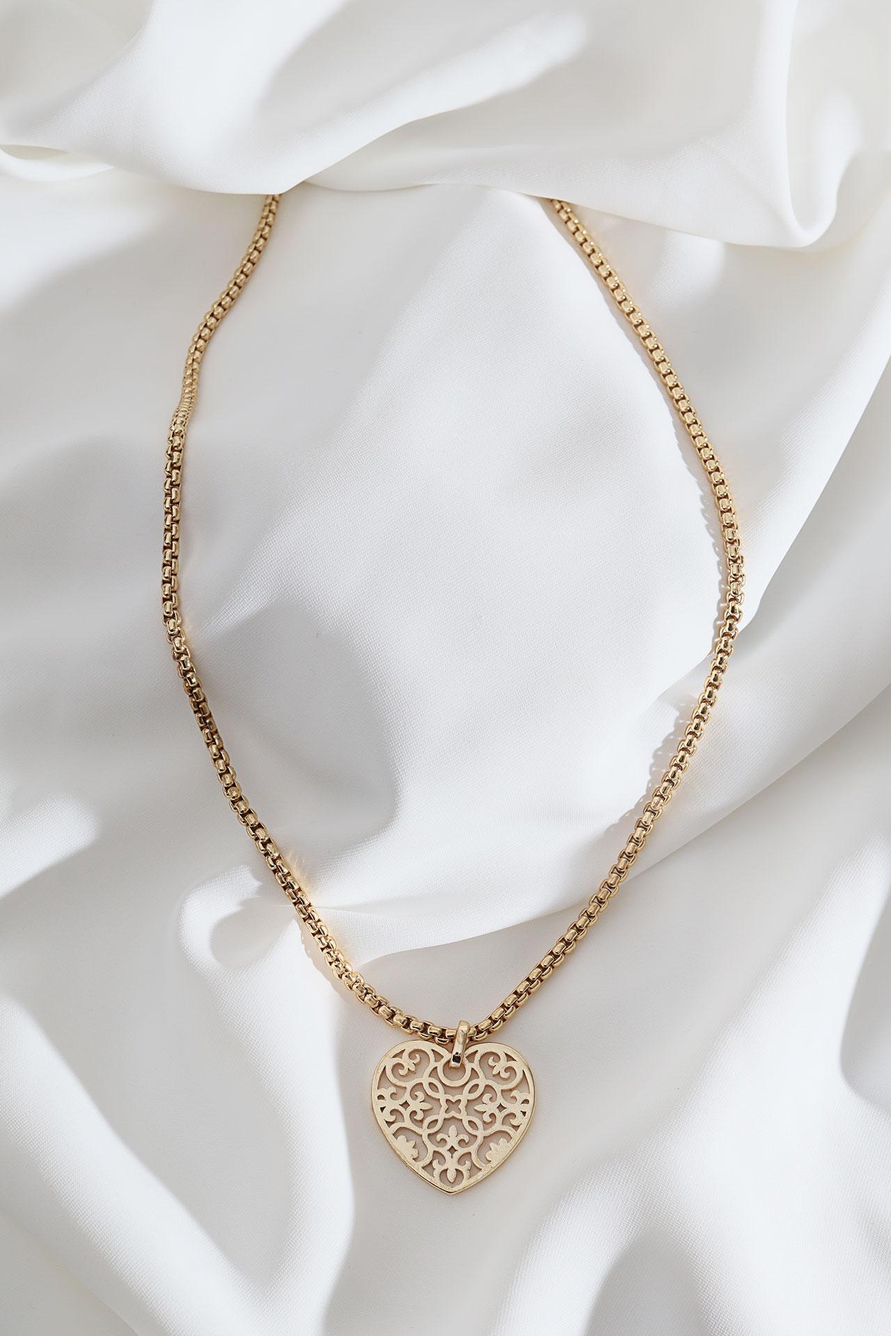 

Золотое колье с мотивом сердца