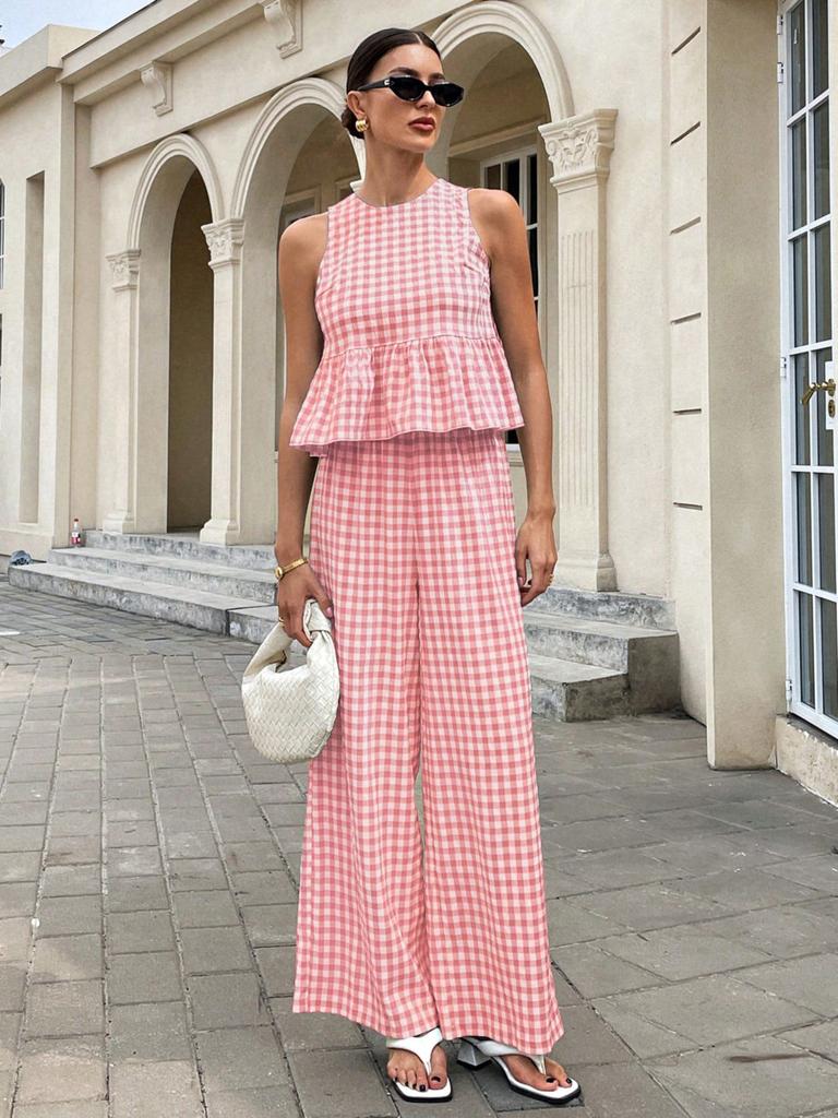 Completo da donna con crop top senza maniche a quadretti Vichy e pantaloni a gamba larga