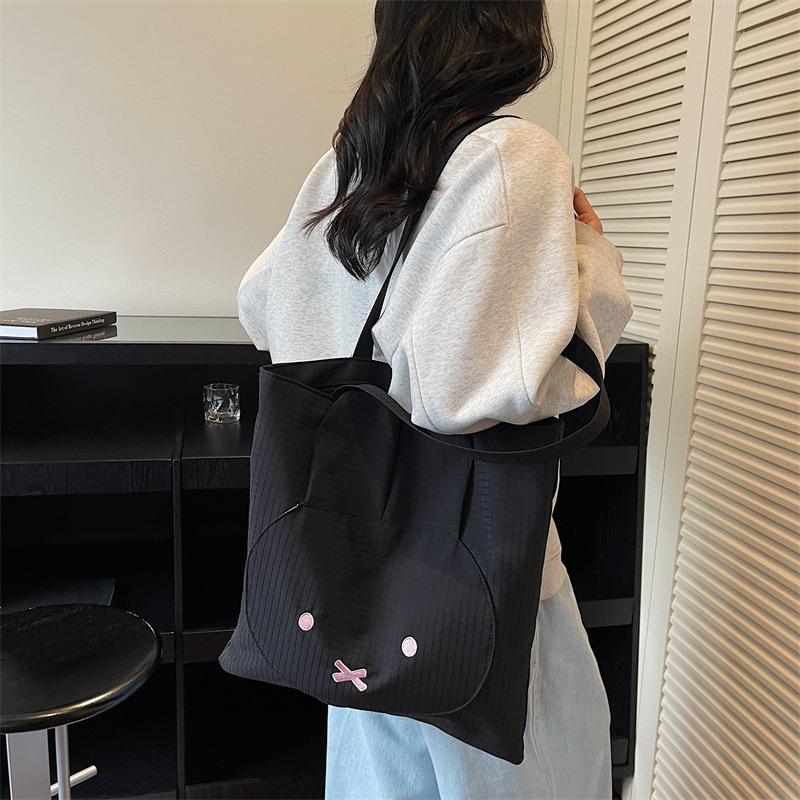 Lightweight cloth bag women's large-capacity new autumn and winter versatile cute shoulder bag college student class bag