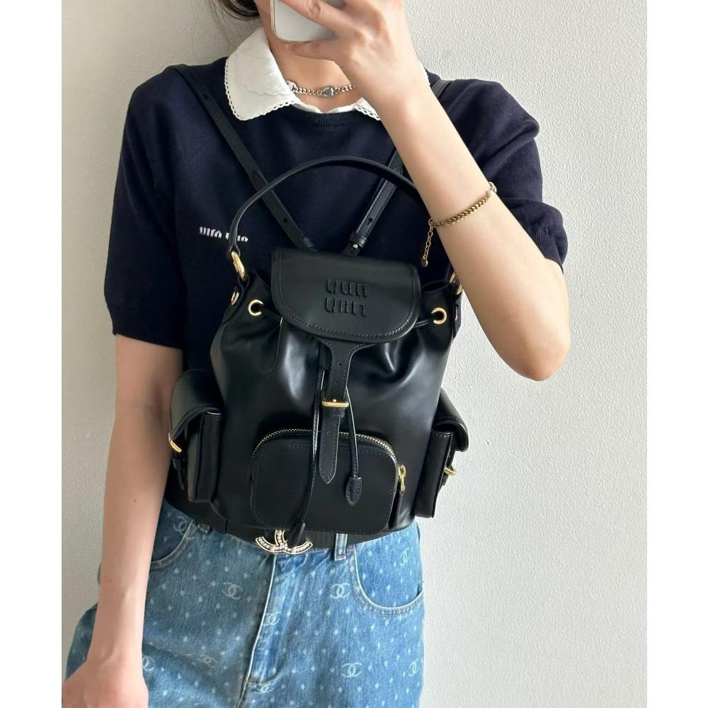 Nový Miao miu 2025 plátěný batoh velkokapacitní prémiový pocit všestranný přenosný ramenní cestovní dojížděcí batoh