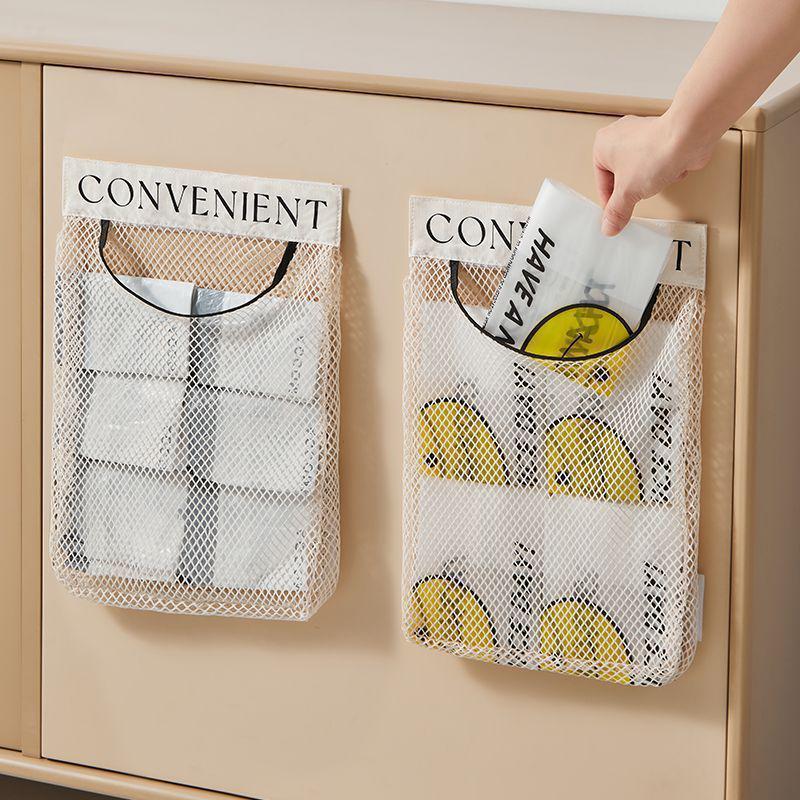 Wall-Mounted Kitchen Garbage Bag Storage: Large-Capacity, Multi-Functional Plastic Bag Organizer with Mesh Pocket for Cabinet Doors.