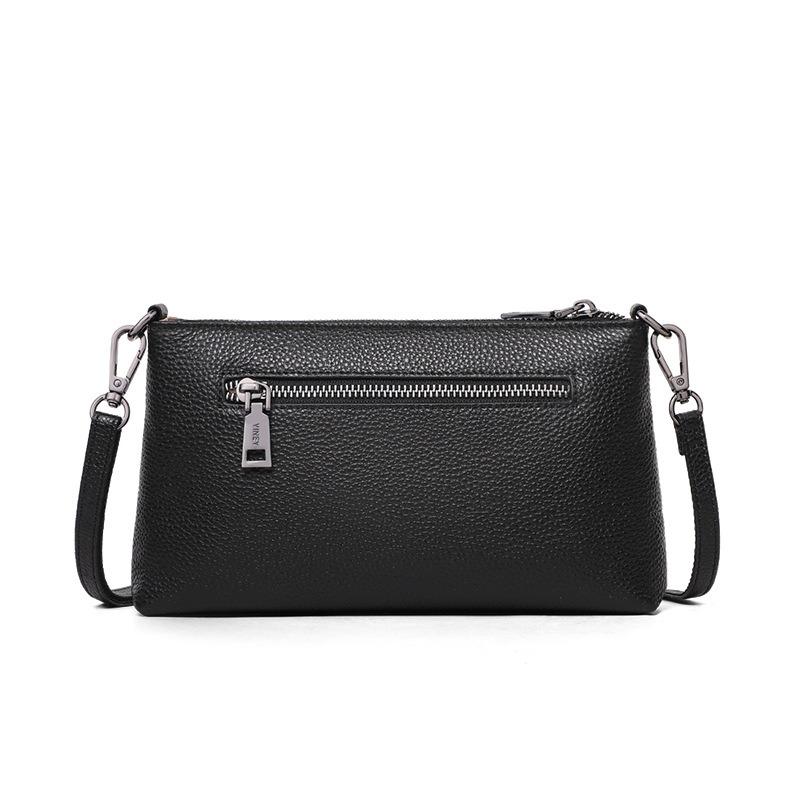 Frühling und Sommer neue schwarze Litschi-Muster weiches Leder Unterarmtasche vielseitige Schulter-Umhängetasche lässige Pendlertasche