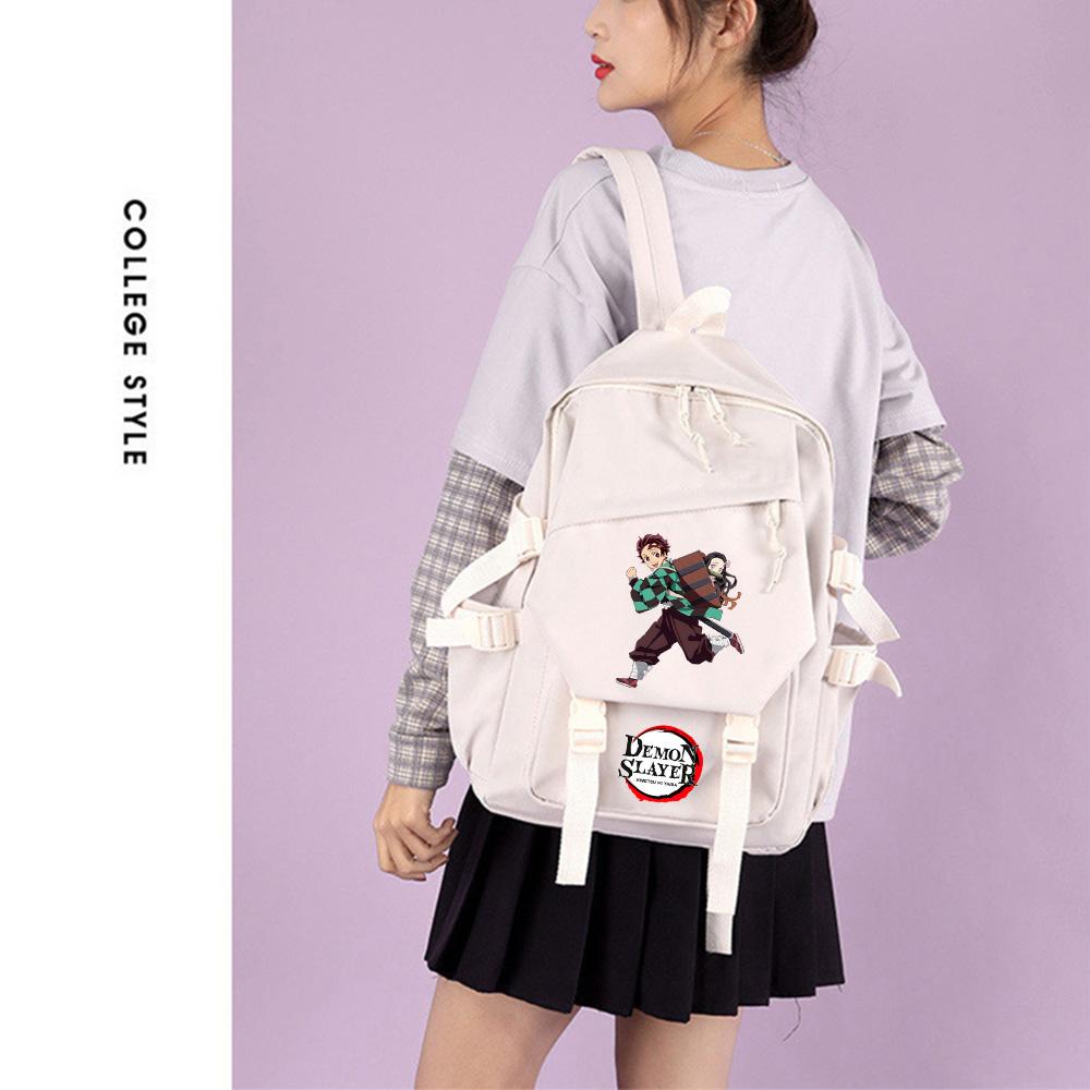 Sac à dos imprimé Demon Slayer pour adolescent étudiant Rentrée scolaire Sac à livres Femme Grande capacité Imperméable Sac de voyage