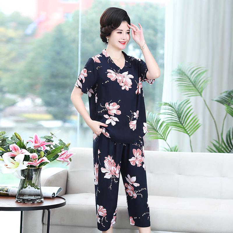 

Бавовняний літній комплект великого розміру: Футболка з коротким рукавом та штани сім восьмих для жінок середнього віку 4XL