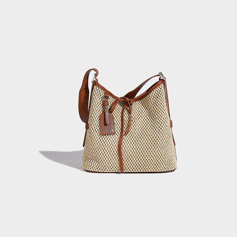 Стильная плетёная соломенная сумка-ведро с镂镂, новая, с вставками, большая вместимость, на одно плечо, пляжная сумка