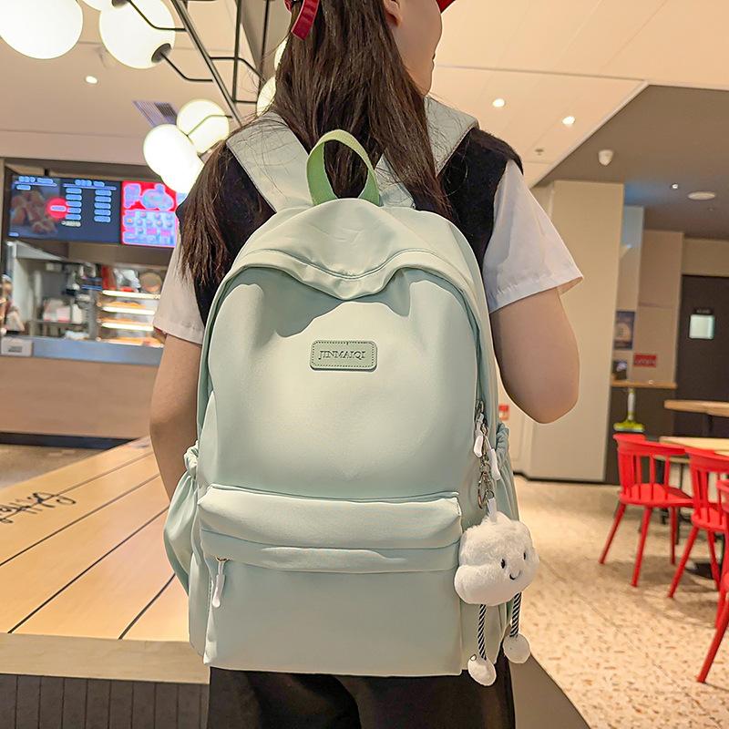 Schoolbag new female students junior high school students high school students large capacity college students backpack wind simple backpack computer
