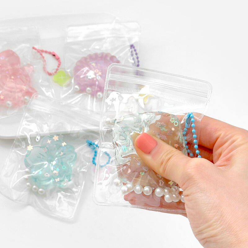 1 box of 16 bling pocket soft keyrings